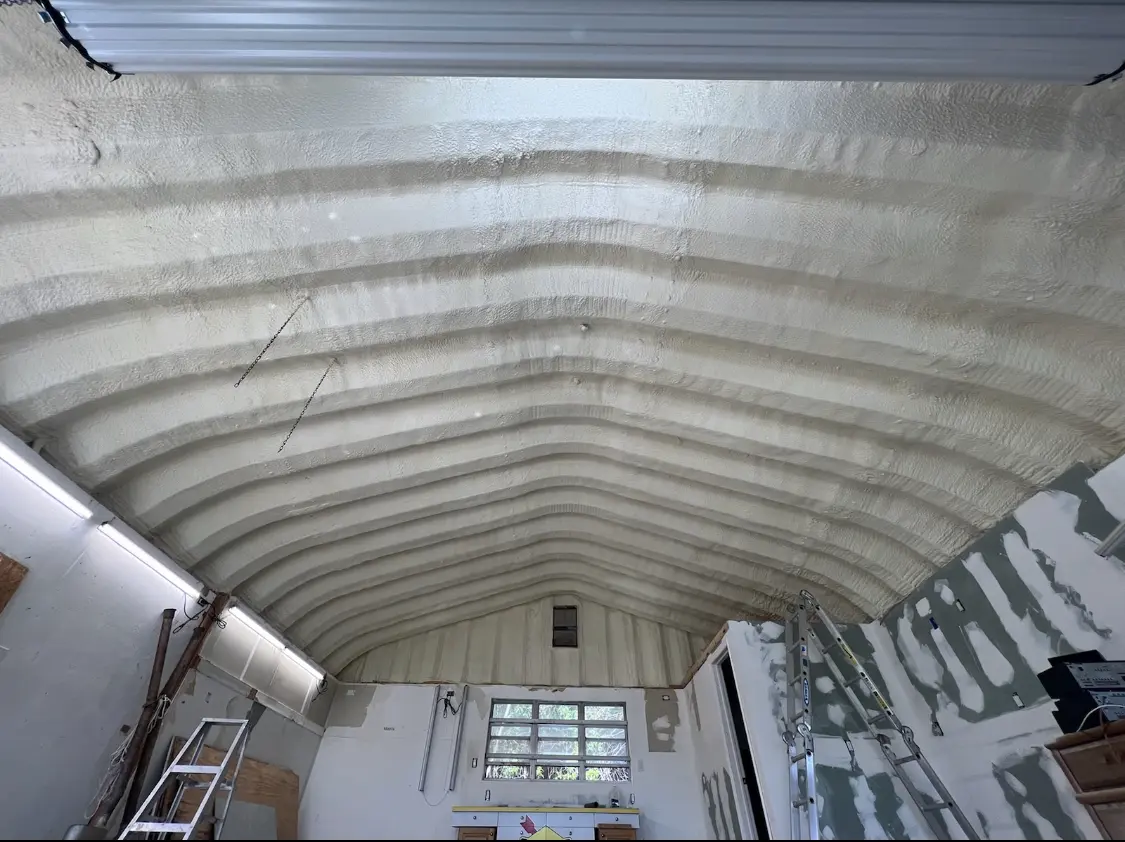 Spray polyurethane foam applied to the underside of a metal roof deck in East Lyme